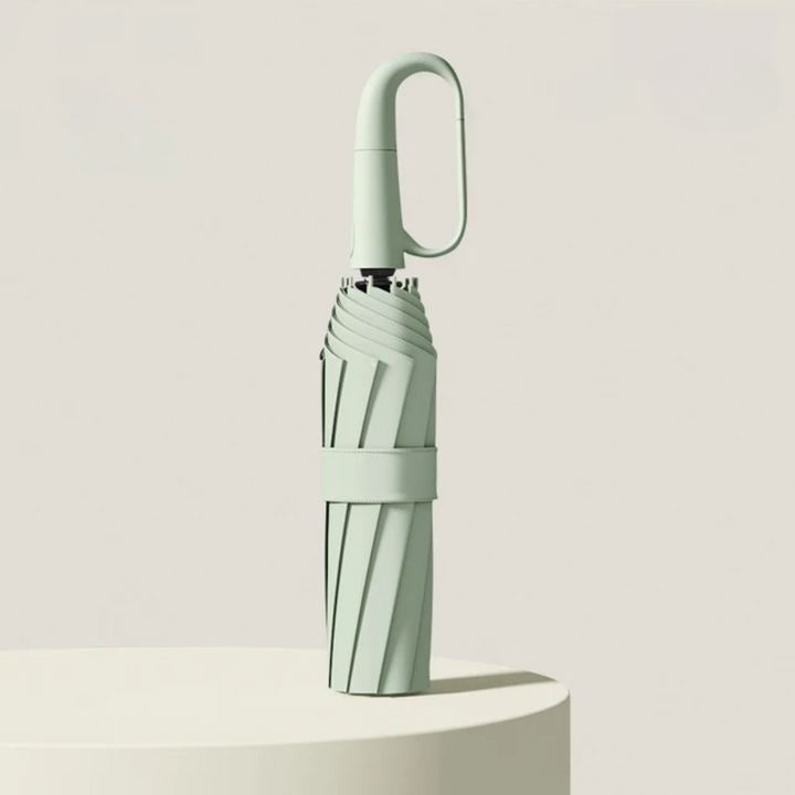 Zusammenklappbarer grüner Regenschirm mit Haken, kompakt, stilvoll, tragbar, wetterfest.