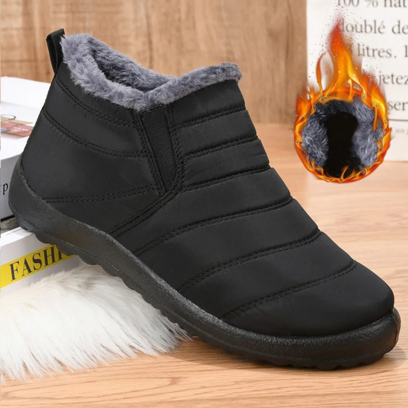 Schwarzer Fleece-Stiefelette, warm gefüttert, rutschfeste Sohle, ideal für Winterwetter.