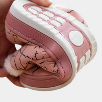 Rosa, flexible Kinderhausschuhe mit rutschfester Sohle, bequem und warm.