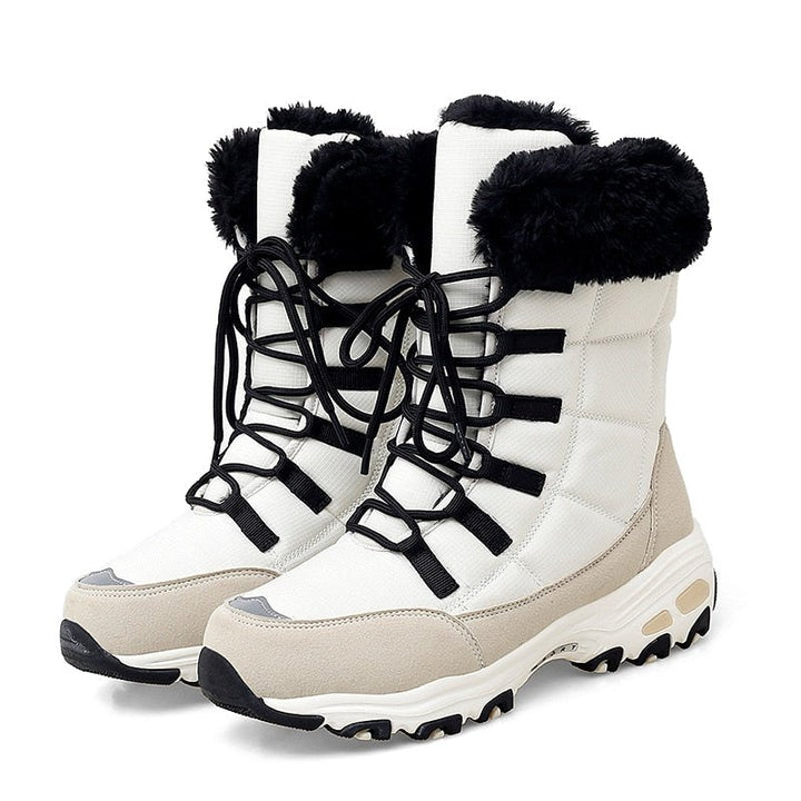 Weiße Winterstiefel mit schwarzem Kunstfell, Schnürung, rutschfeste Sohle, Damenmode.