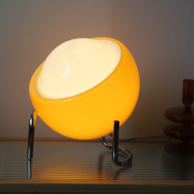 Gelbe Tischlampe aus Glas, modern, kugelförmig, auf Metallständer, Wohnzimmerbeleuchtung.