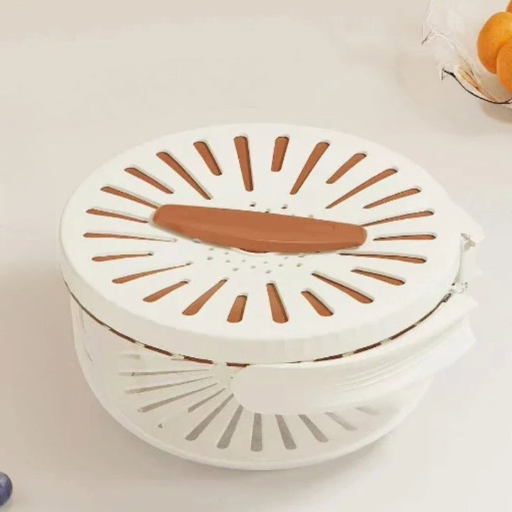 Weißer Kunststoff-Salatschleuder mit Deckel, Küchenzubehör, runde Form, modernes Design.