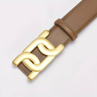 Brauner Ledergürtel mit goldener Schnalle, modisches Accessoire für Damen und Herren.