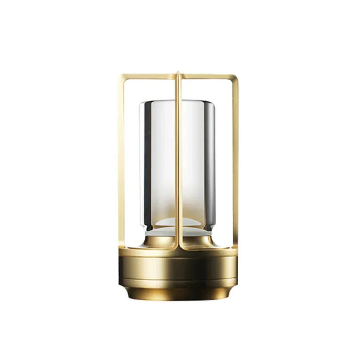 Goldene LED-Tischlampe, modernes Design, Glaszylinder, dekorative Beleuchtung, minimalistisch.