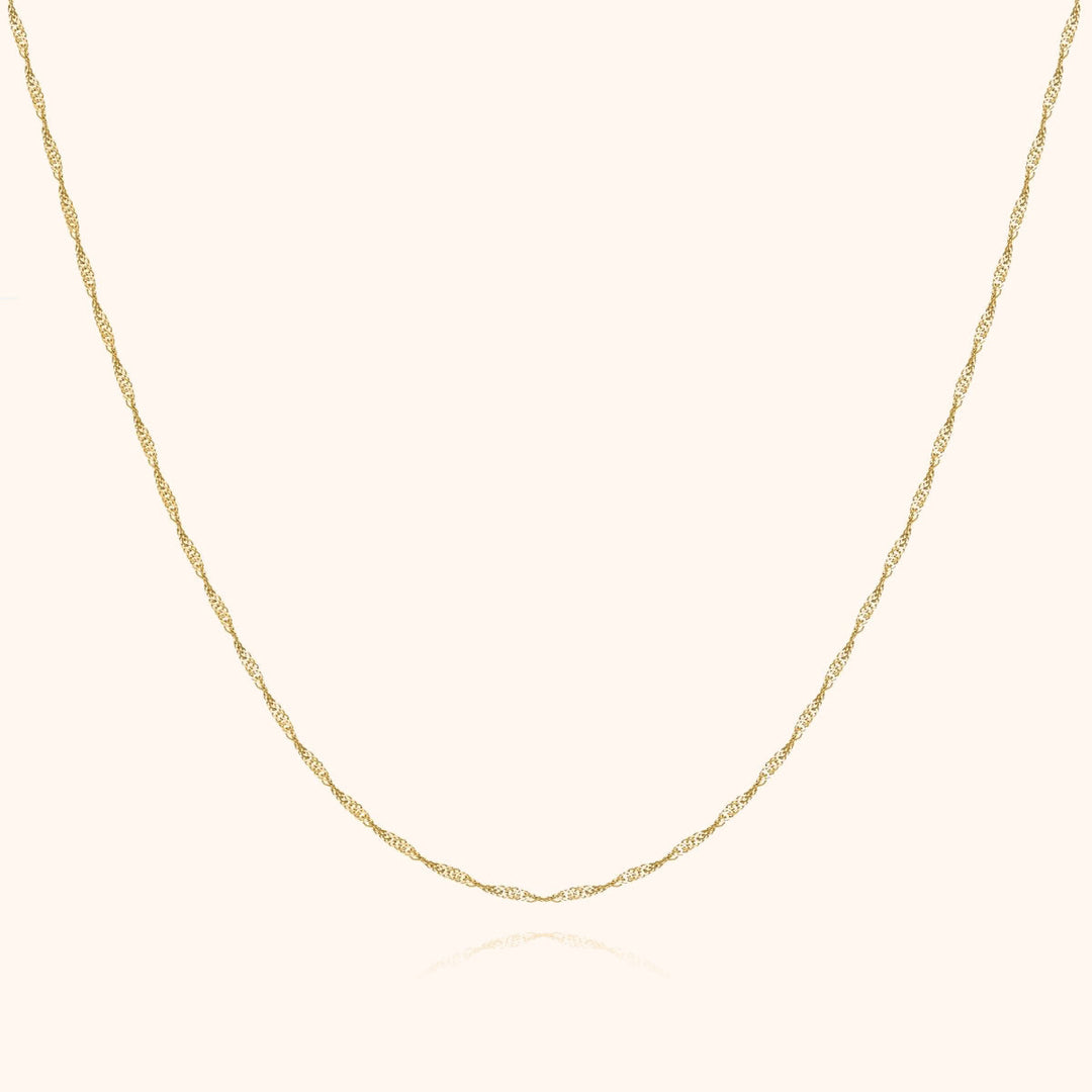 Goldene Halskette, filigranes Design, 14 Karat, eleganter Schmuck für Damen.