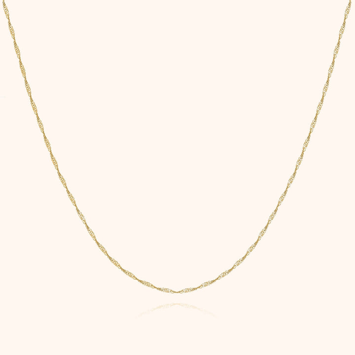 Goldene Halskette, filigranes Design, 14 Karat, eleganter Schmuck für Damen.