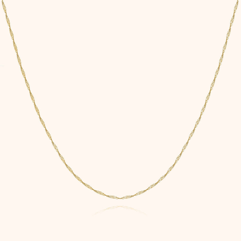 Goldene Halskette, filigranes Design, 14 Karat, eleganter Schmuck für Damen.