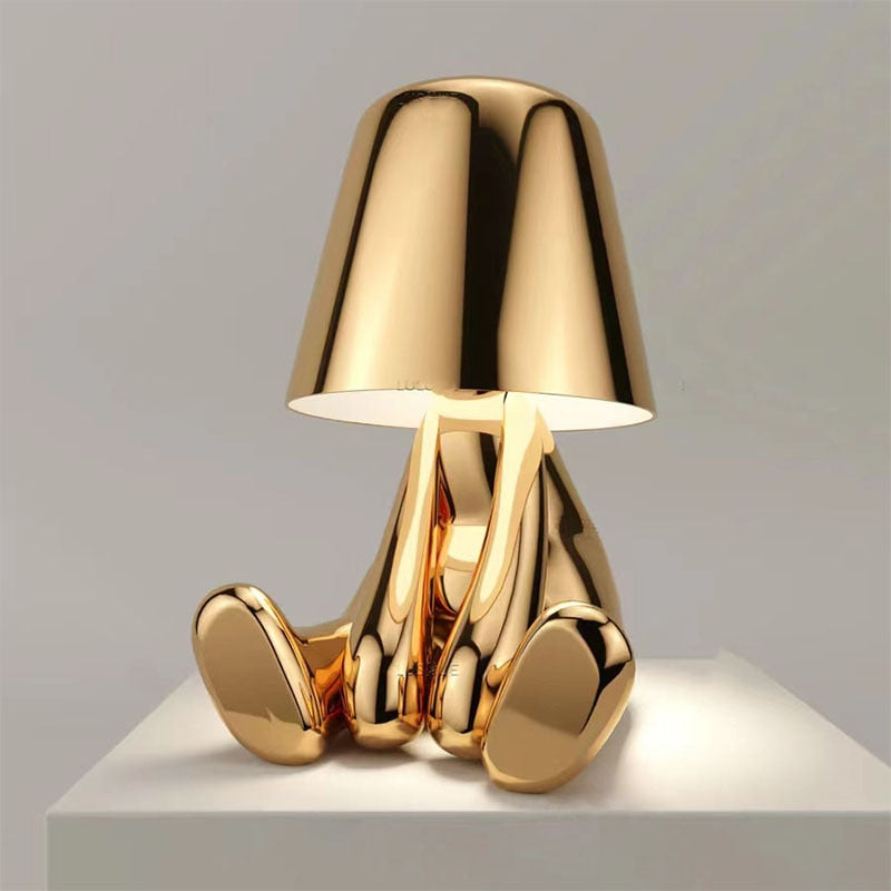 Goldene Tischlampe in Hasenform, modernes Design, glänzend, dekorative Beleuchtung.