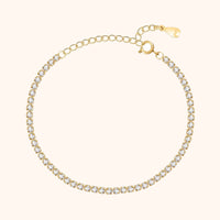 Goldenes Tennisarmband mit Zirkonia-Steinen, verstellbar, elegantes Schmuckstück für Damen.