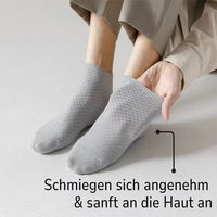 Graue Bambussocken, atmungsaktiv, hautfreundlich, bequem, ideal für empfindliche Haut.