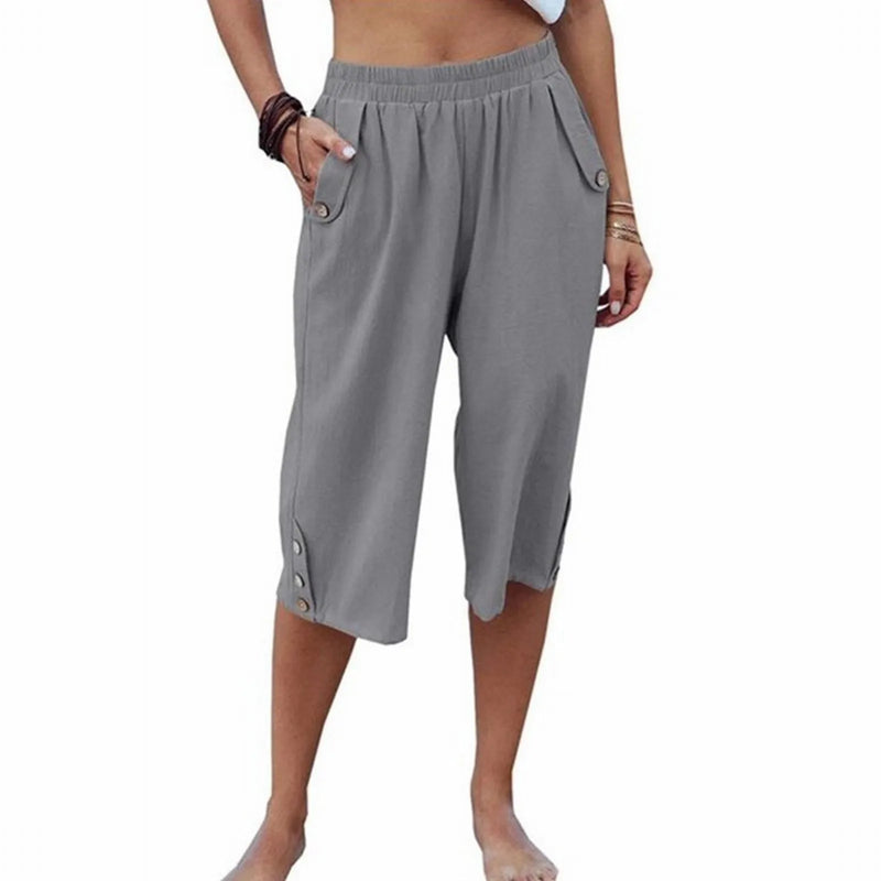 Graue Damen-Caprihose mit Taschen, elastischem Bund, Knöpfen, lässig, bequem, Sommermode.