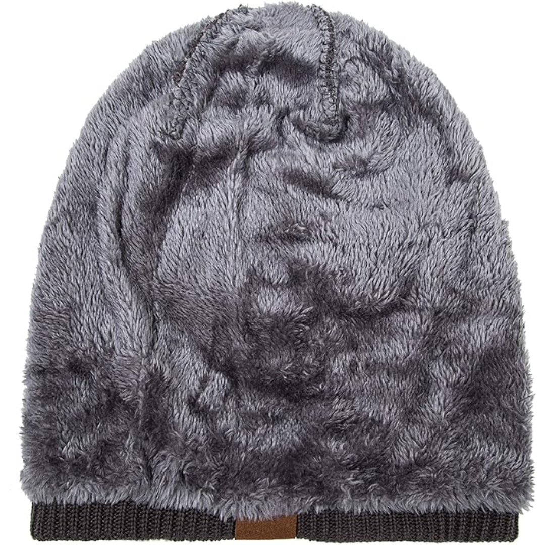 Graue, flauschige Wintermütze aus Kunstfell, warm und stilvoll für kalte Tage.