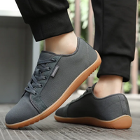 Graue Barfußschuhe mit Gummisohle, atmungsaktiv, für Damen und Herren, ideal für Outdoor-Aktivitäten.