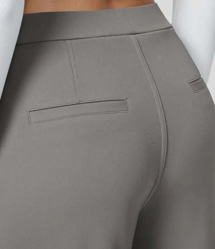Graue Damenhose aus Stretchmaterial, Rückansicht, elegantes Design, Businessmode.