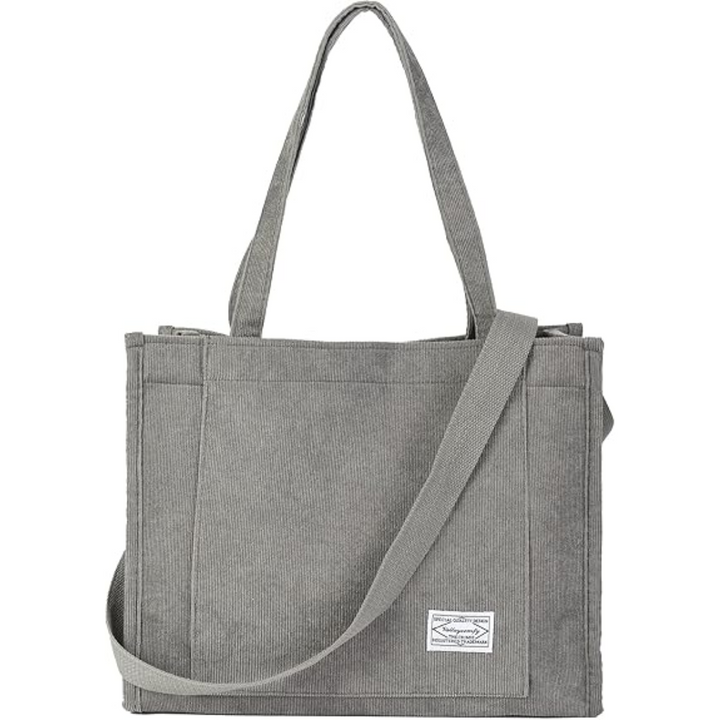 Graue Canvas-Umhängetasche, vielseitig, robust, mit Reißverschluss, ideal für Alltag und Reisen.