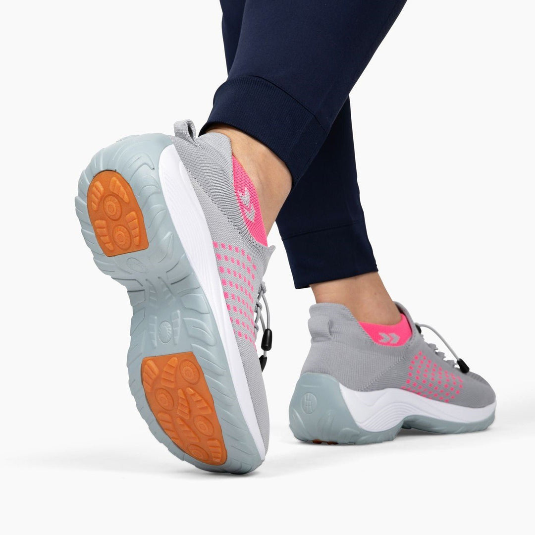 Graue Orthopädische Stretch-Schuhe, pinke Details, rutschfeste Sohle, Damen Sneaker.
