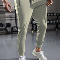Graue Jogginghose Herren, Fitnessstudio, Sportbekleidung, elastisch, bequem, modern.