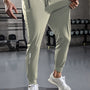 Graue Jogginghose Herren, Fitnessstudio, Sportbekleidung, elastisch, bequem, modern.