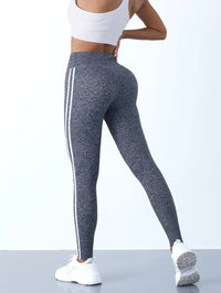 Damen Sportleggings grau mit Streifen, hoch tailliert, elastisch, ideal für Fitness und Yoga.