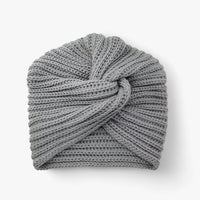 Graue gestrickte Damen-Turbanmütze aus Wolle, modisches Accessoire für Herbst und Winter.