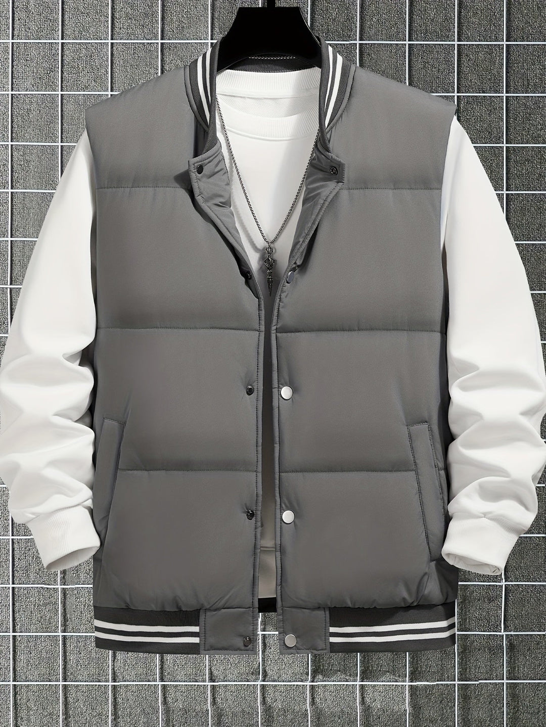 Graue Herren-Steppweste mit weißen Ärmeln, sportlich, modisch, Herbstmode, Herrenbekleidung.