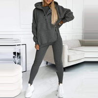 Damen Jogginganzug grau, Kapuzenpullover und Leggings, bequem, modisch, Freizeitkleidung.