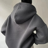 Dunkelgrauer Kapuzenpullover aus Baumwolle, lässiger Stil, Rückansicht, modische Freizeitkleidung.