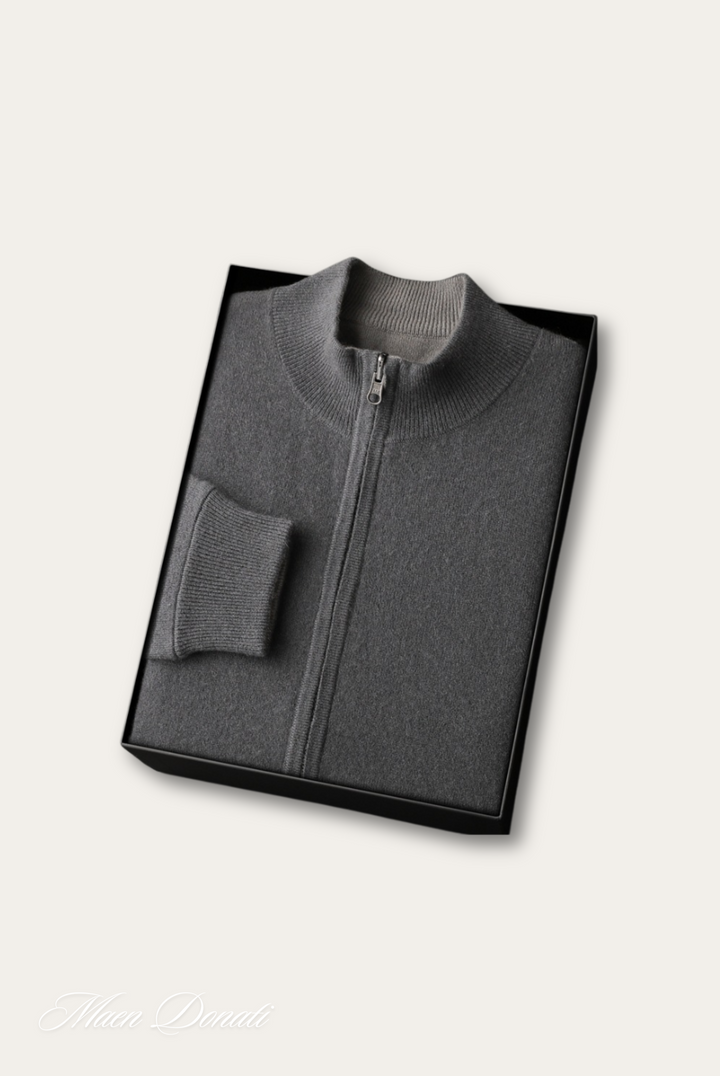 Grauer Kaschmirpullover mit Reißverschluss, gefaltet in schwarzer Geschenkbox, luxuriöse Mode.