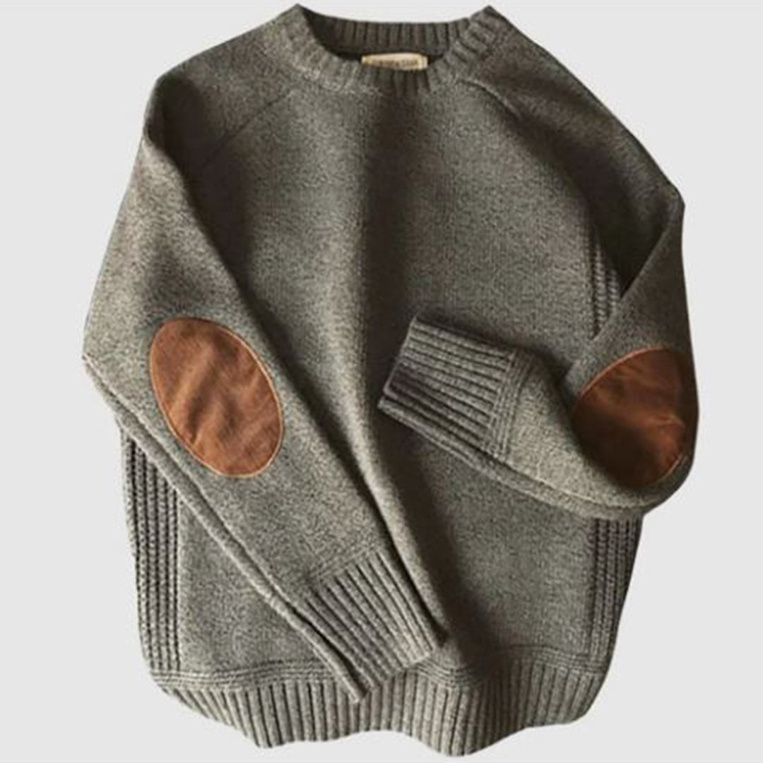 Grauer Wollpullover mit braunen Ellbogen-Patches, Herrenmode, warm, stilvoll.