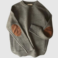 Grauer Wollpullover mit braunen Ellbogen-Patches, Herrenmode, warm, stilvoll.