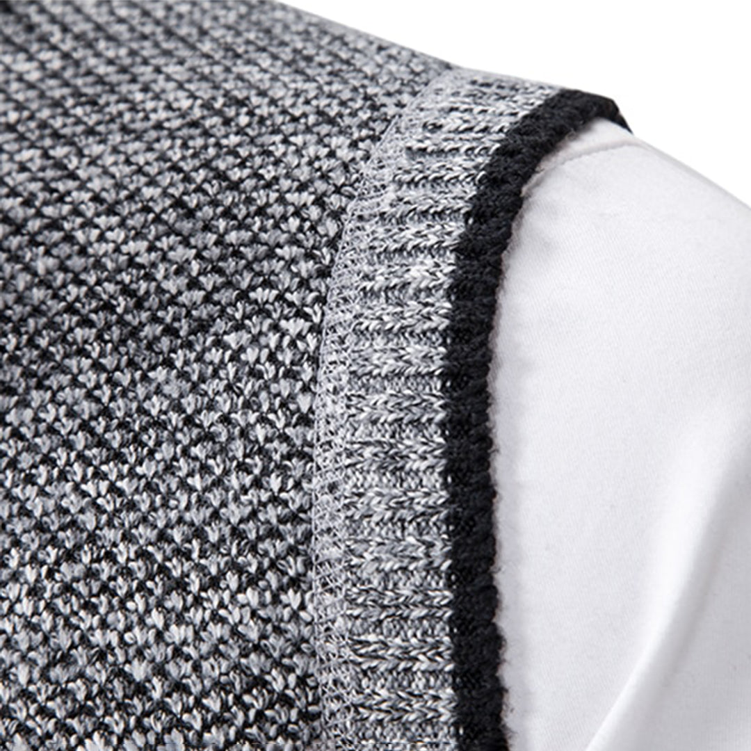 Grauer Strickstoff, Nahaufnahme, Textur, Detailansicht, hochwertige Materialien, Mode, Bekleidung.