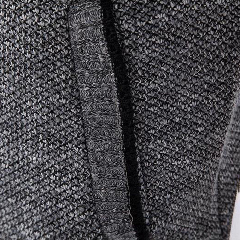 Grauer Strickstoff, Nahaufnahme, Textur, weiches Material, Mode, Bekleidung, Detailansicht.