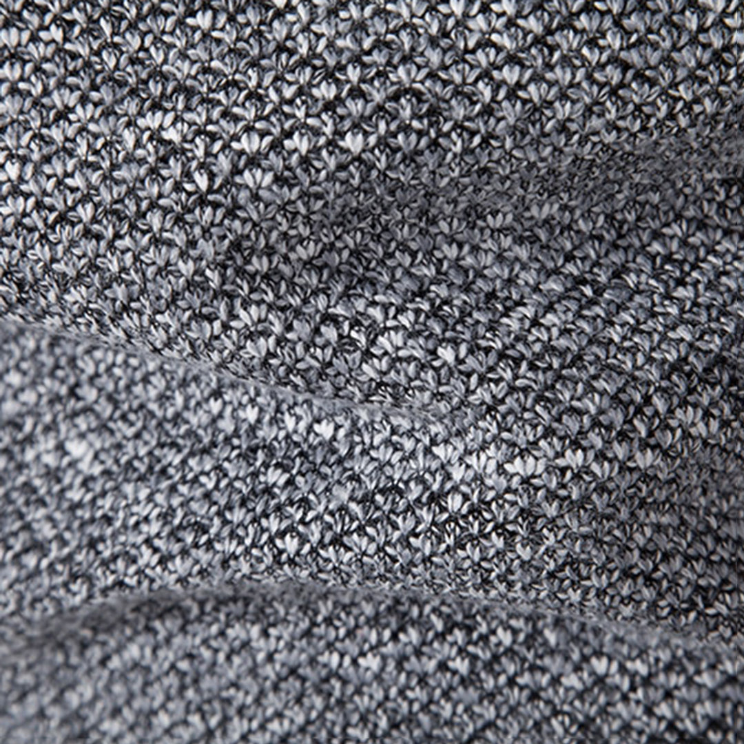 Graues Strickgewebe, Nahaufnahme, Textur, weiches Material, modisch, hochwertig, Detailansicht.