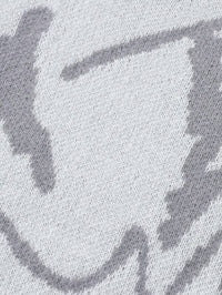 Grauer Baumwollstoff mit abstraktem Muster, weiche Textur, ideal für Bekleidung und Dekoration.