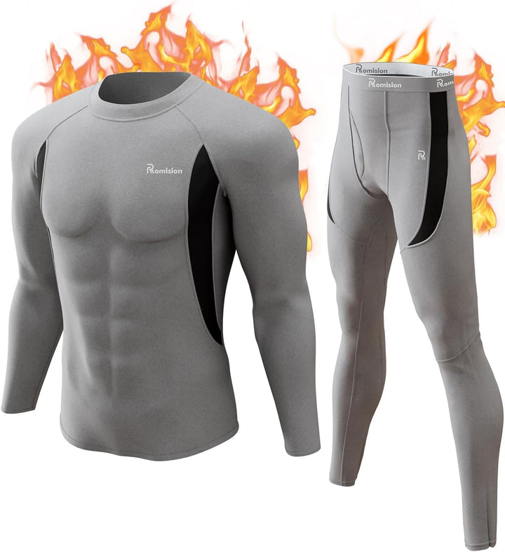 Graues Kompressionsshirt und -hose Set, langarm, atmungsaktiv, für Sport und Fitness.