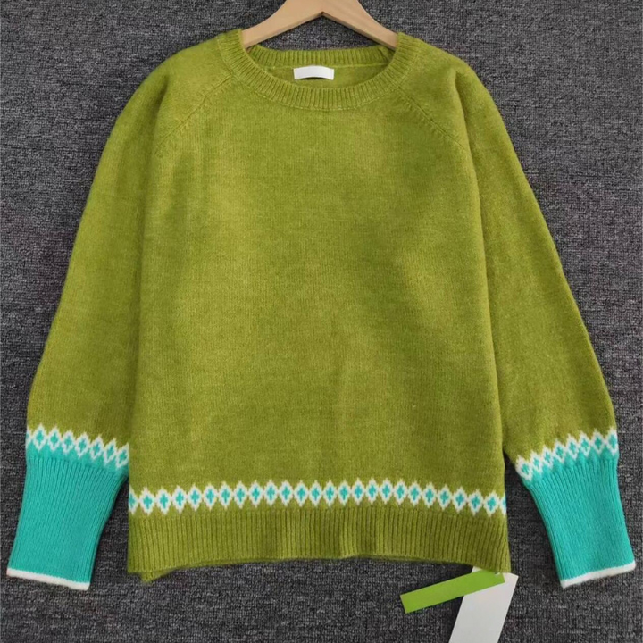 Grüner Pullover aus Wolle mit blau-weißem Muster, Rundhalsausschnitt, Damenmode.