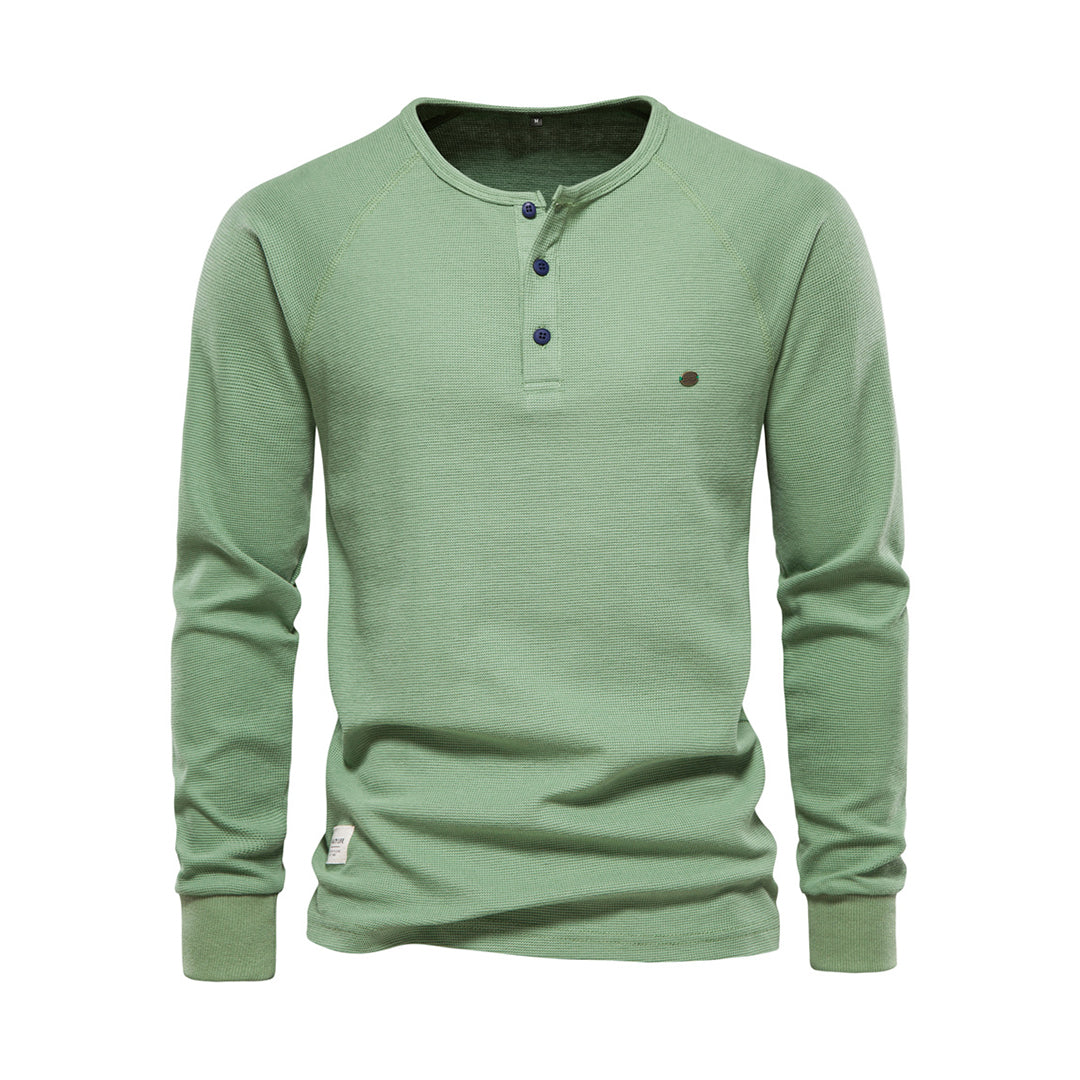 Grünes Herren-Henley-Shirt, Langarm, Baumwolle, Knopfleiste, Freizeitmode.
