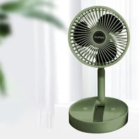 Grüner Tischventilator, kompakt, leise, energieeffizient, ideal für Büro und Zuhause.