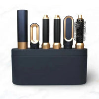 Schwarzer und goldener Haarstyler-Set mit Aufsätzen, ideal für Locken und Glätten.