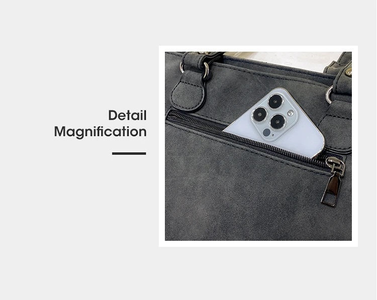 Dunkelgraue Handtasche mit Reißverschluss, iPhone in Tasche, elegantes Design, Damenmode.