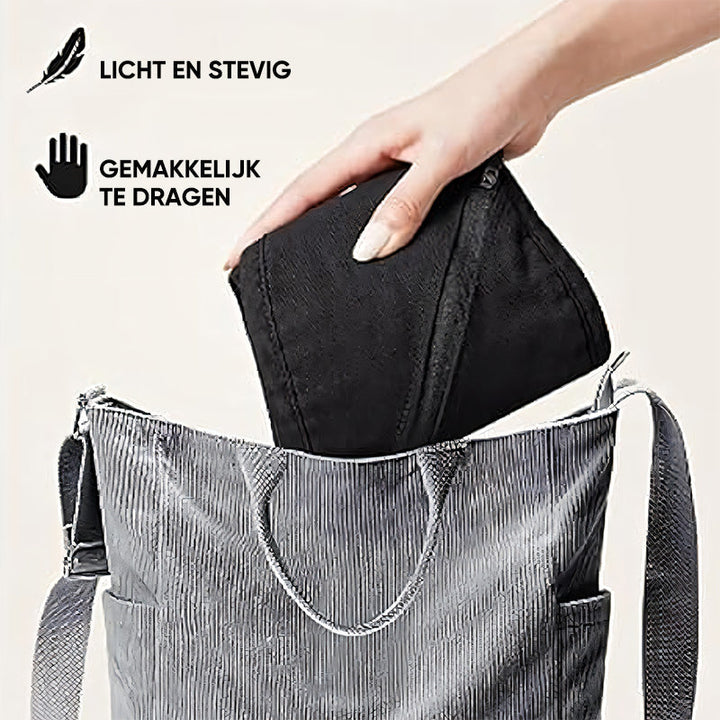 Handtasche grau, leicht, robust, mit schwarzem Innenfach, ideal für Damen, Alltag, Reisen.