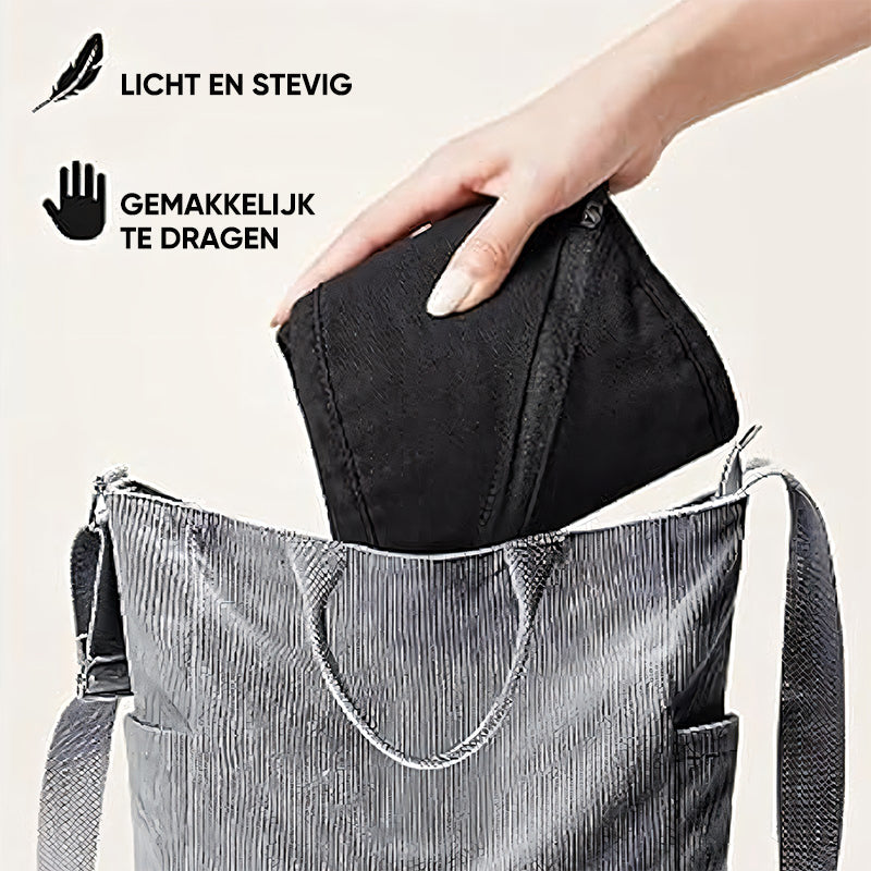 Handtasche grau, leicht, robust, mit schwarzem Innenfach, ideal für Damen, Alltag, Reisen.