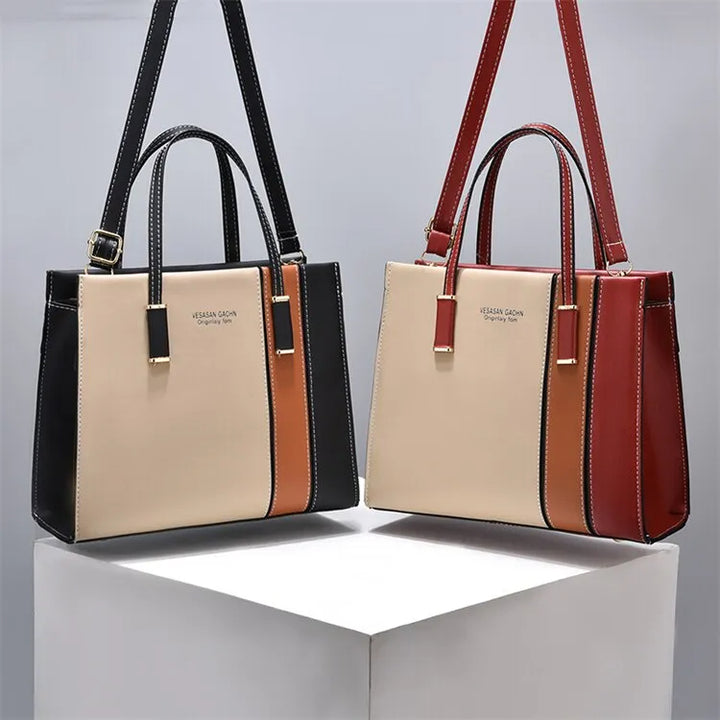 Zweifarbige Damenhandtasche aus Leder, schwarz-beige und rot-beige, elegant, modern.