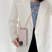 Damen Crossbody Handyhülle, rosa Leder, mit Kartenfach, modisch und praktisch für unterwegs.