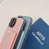 Rosa und blaue Handyhüllen aus Leder mit Kartenfach, modisch und praktisch für Smartphones.