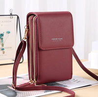 Rote Damenhandtasche aus Leder mit Schulterriemen, modisch, elegant, vielseitig einsetzbar.