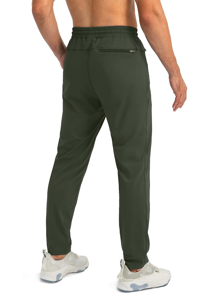 Grüne Herren-Trainingshose, elastischer Bund, atmungsaktiv, ideal für Sport und Freizeit.