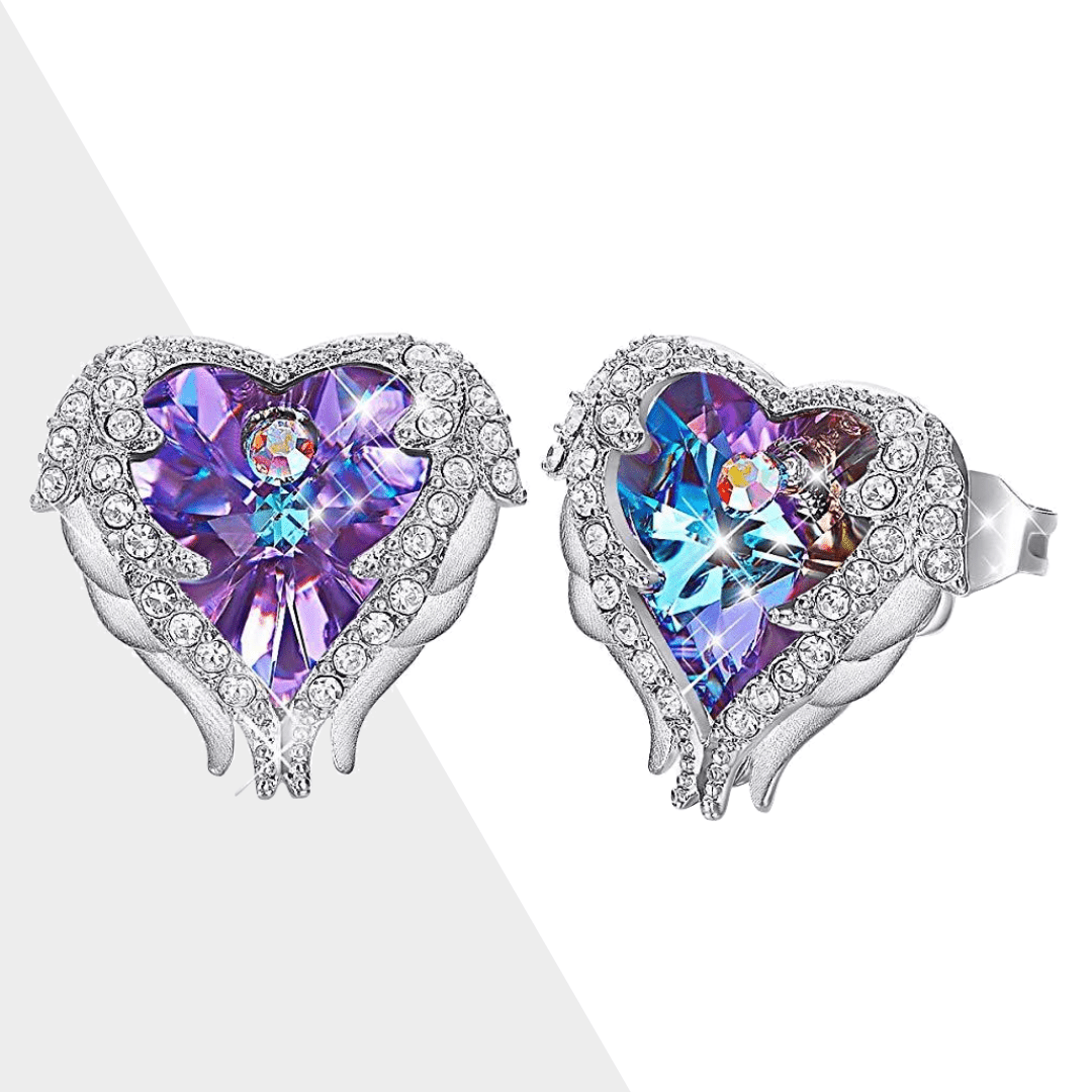 Herzförmige Engelsflügel-Ohrringe mit lila Kristallen und Strasssteinen, silberfarben.