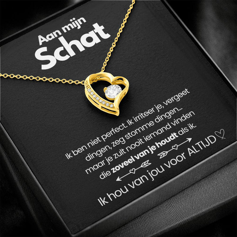 Goldene Herz-Halskette mit Diamant auf schwarzem Hintergrund, Geschenkbox, Schmuck für Damen.