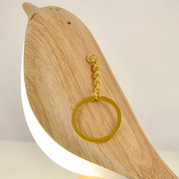Holz-Vogel-Lampe mit goldfarbenem Schlüsselanhänger, modernes Design, LED-Beleuchtung.